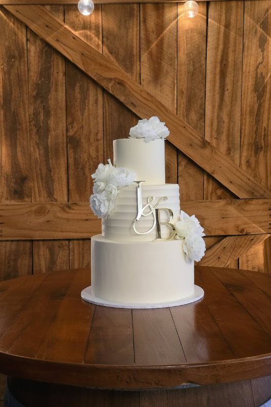 3 tire white flower cake